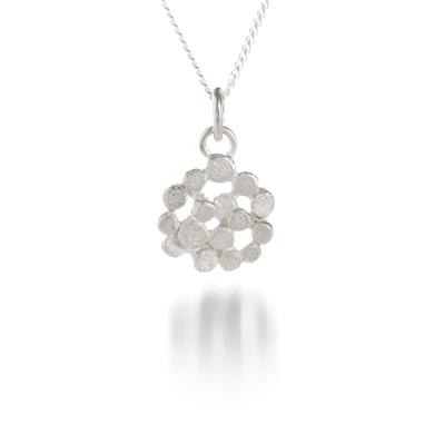 Petit pendentif de petits disques en argent